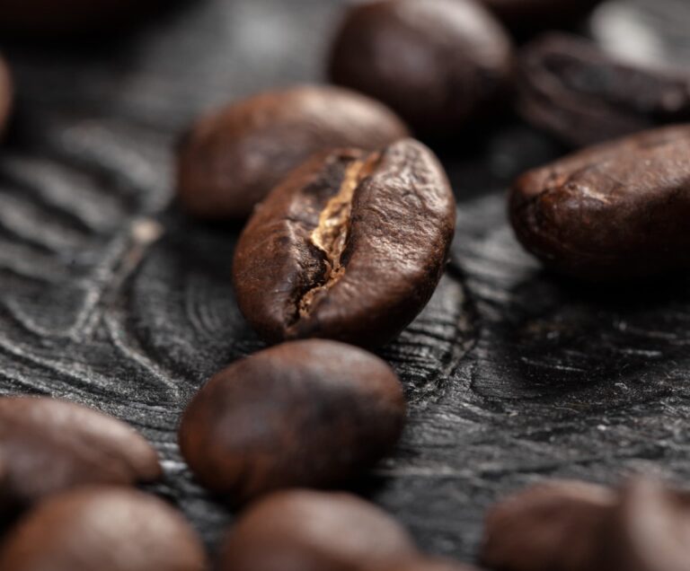 coffee-beans-on-wood-background-2021-12-15-19-51-11-utc